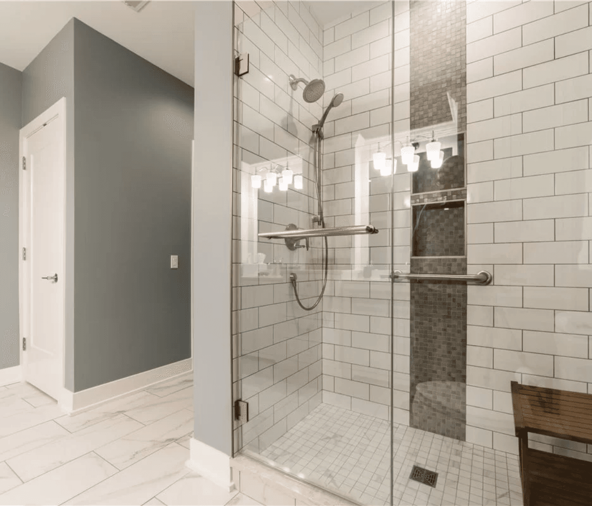 Bathroom remodeling in Chicago — tiled walk-in shower and modern fixtures by AMG Proline